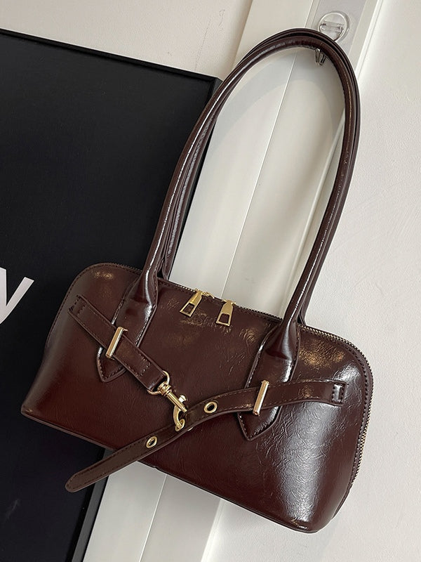 Kleine Handtasche im Muschel-Design