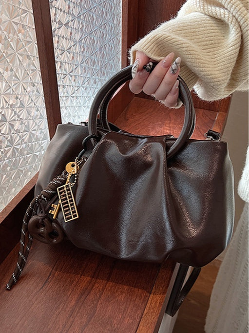 Leichte Crossbody-Tasche in Wolkenform