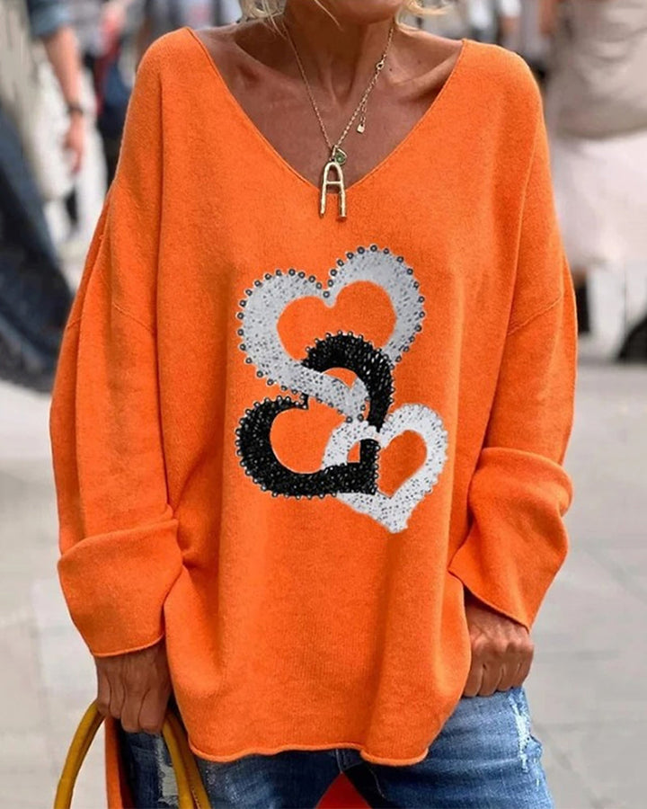 Charlotte | Weicher Strickpullover mit Herzchenprint und V-Ausschnitt