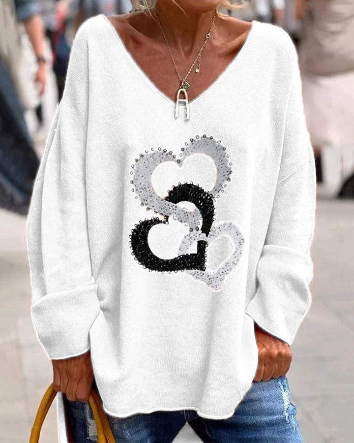 Charlotte | Weicher Strickpullover mit Herzchenprint und V-Ausschnitt