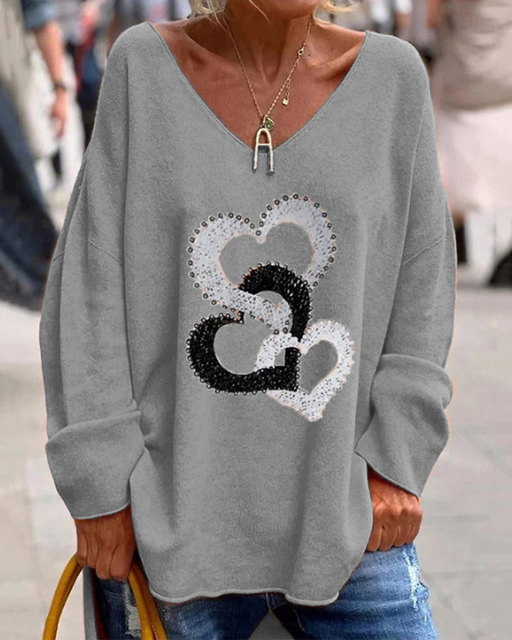 Charlotte | Weicher Strickpullover mit Herzchenprint und V-Ausschnitt