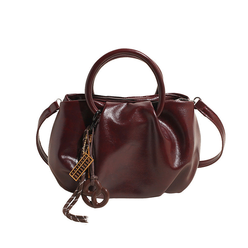 Leichte Crossbody-Tasche in Wolkenform