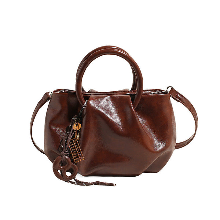 Leichte Crossbody-Tasche in Wolkenform