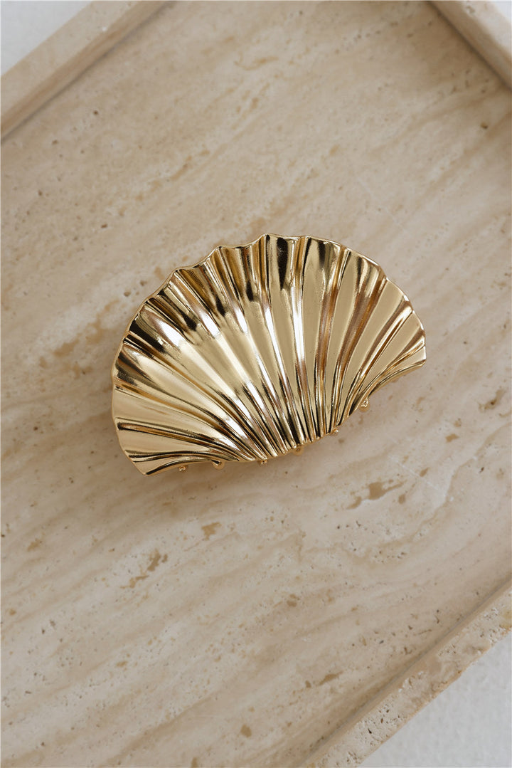 Haarklammer in Goldoptik mit Muscheldesign